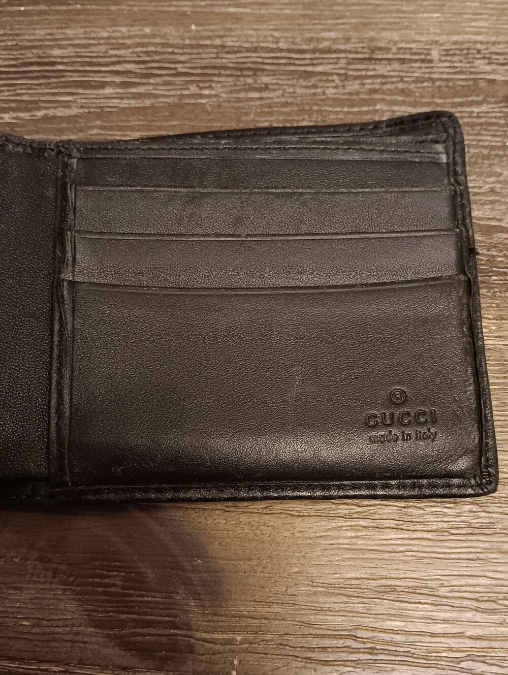 Gucci Black Leather Bifold Wallet with Silver GG Accent